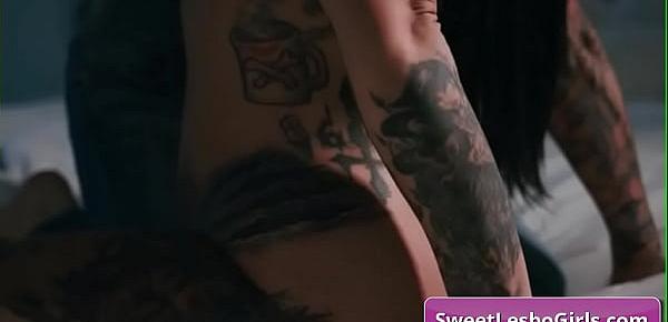  Amazing big boobed lesbian babe Scarlett Sage covered in sexy tats get her pussy licked and fingered deep